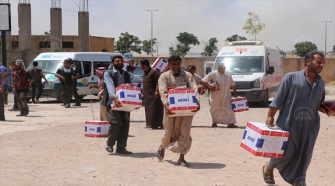 Tel Abyad da ihtiyaç sahiplerine insani yardım dağıtıldı